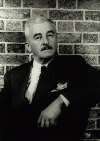 A photograph of William Faulkner