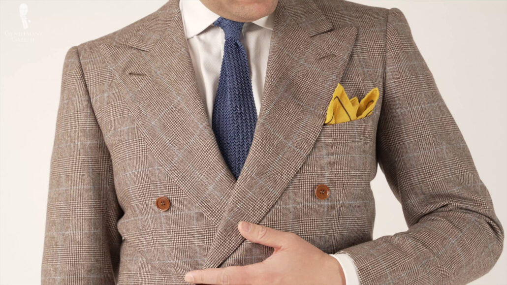 Knit tie in a more relaxed light brown suit ensemble.