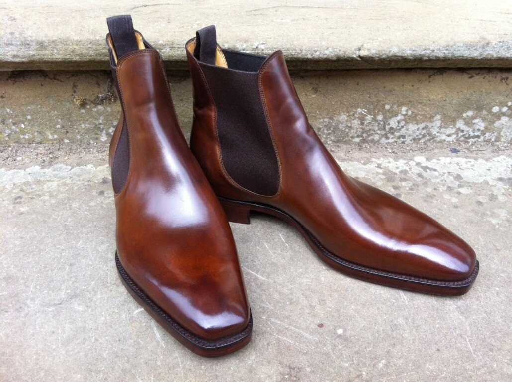 A pair of brown Chelsea boots is a classic and timeless option
