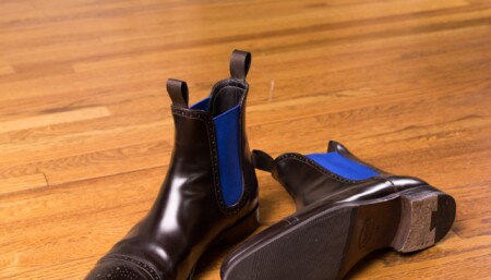 Chelsea boots have pull tabs to assist in putting them on