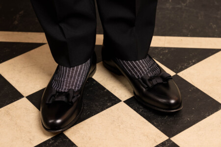Photo of opera pumps worn with black and white formal socks