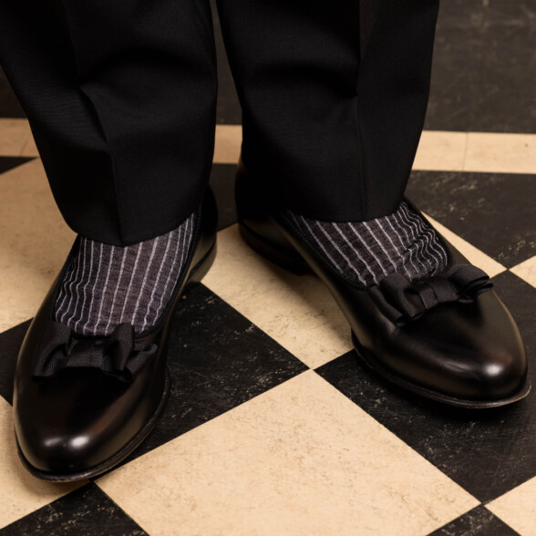 Photo of opera pumps worn with black and white formal socks