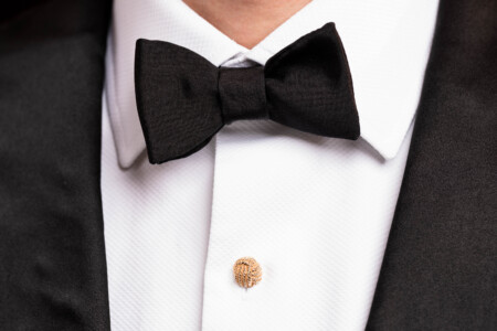 Photo of Black bow tie worn with a semi spread collar