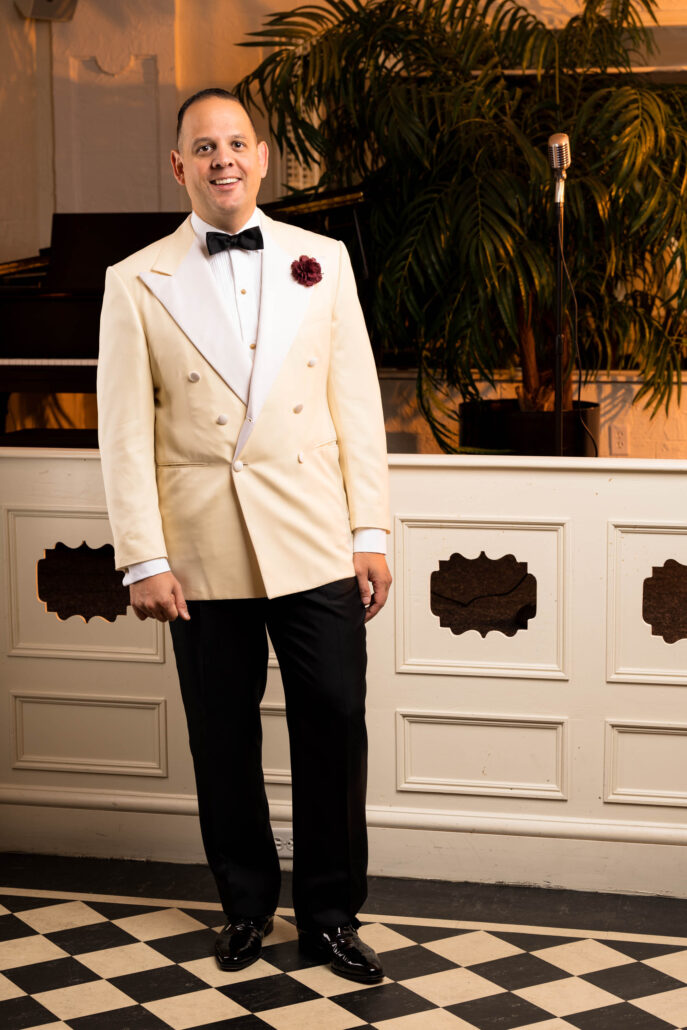 Photo of Raphael in ivory dinner jacket