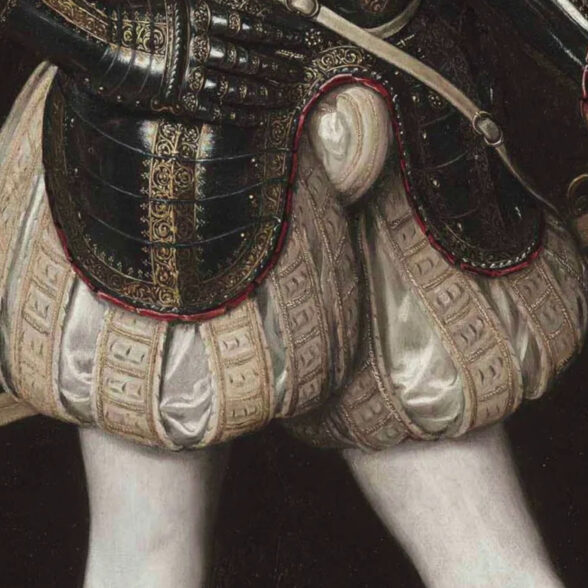 The codpiece is buttoned or tied with strings, to a man’s breeches.