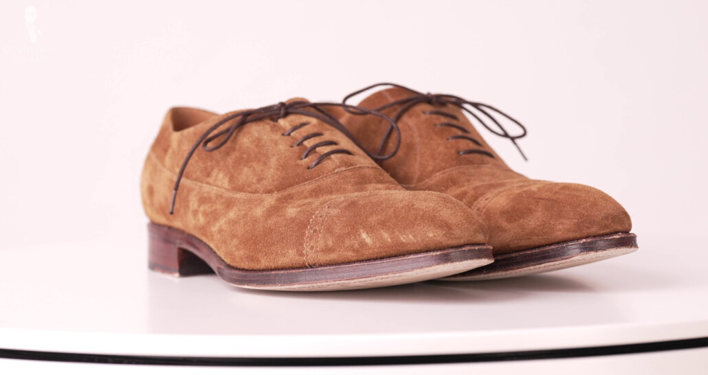A pair of brown suede Yonkos given by Skolyx to Raphael