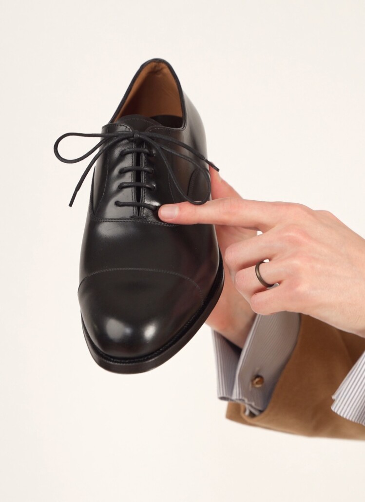 An Oxford shoe is characterized by the closed lacing system