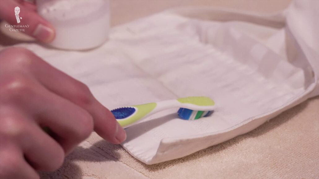 Gently applying of your stain remover to the specific area of the shirt by using a brush.