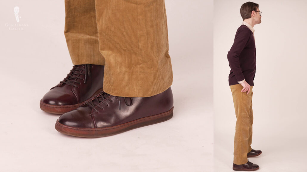 Preston keeps it casual looking with his wine-colored cardigan and corduroy trousers.