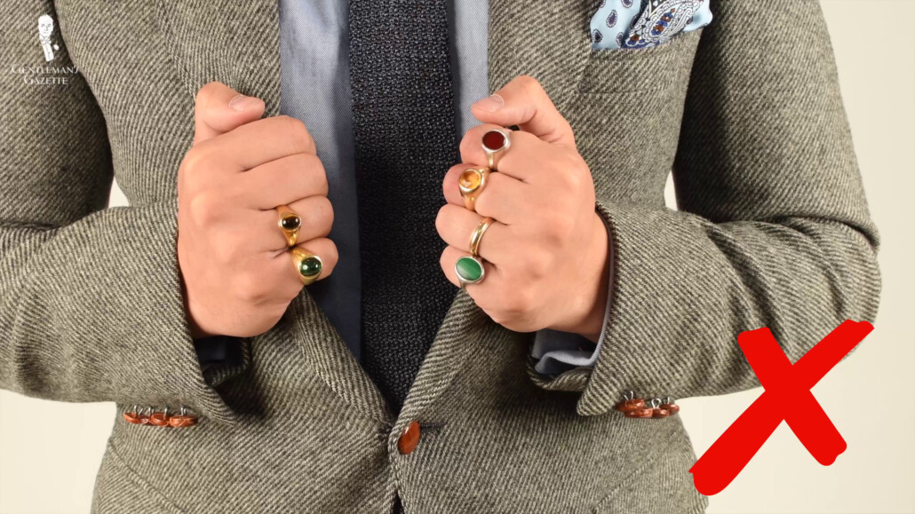 Raphael wearing too many rings
