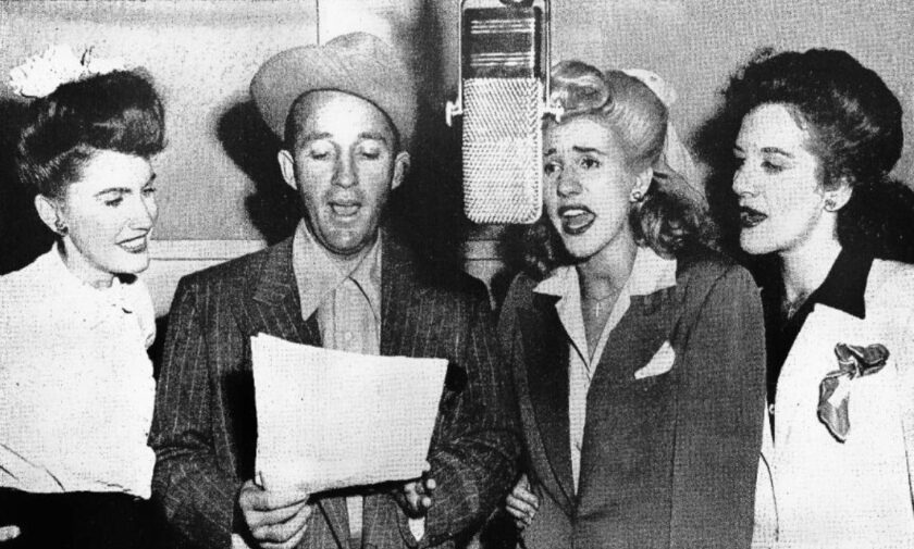 Photo of Bing Crosby with the Andrews Sisters