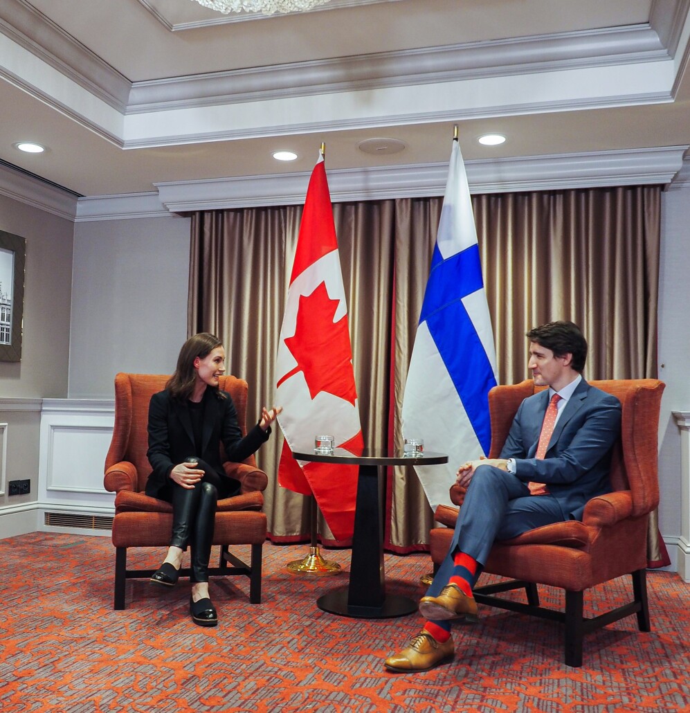 Canadian Prime Minister Justin Trudeau (right) wearing bold socks.