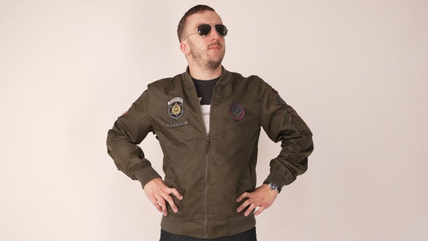 Chris Wearing An Olive Green Bomber Jacket And Aviator Sunglasses Photo of Chris wearing aviators