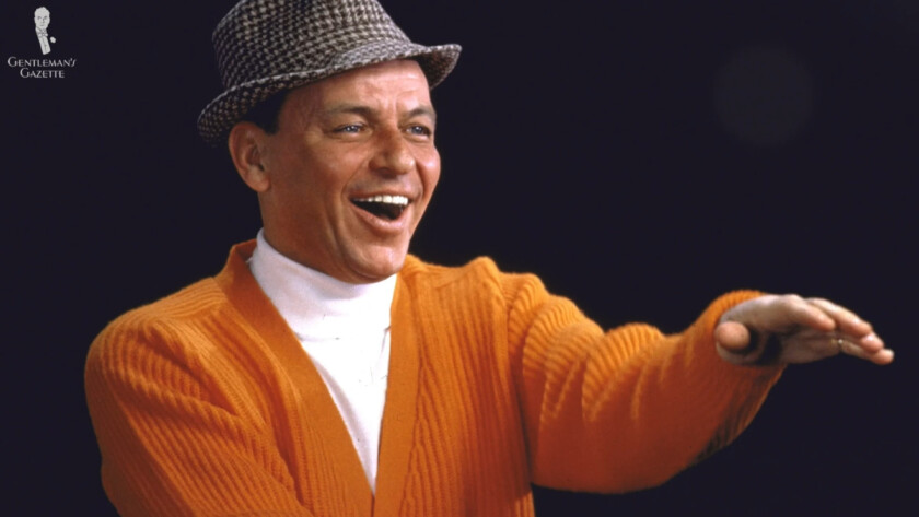 Photo of Sinatra in orange cardigan 