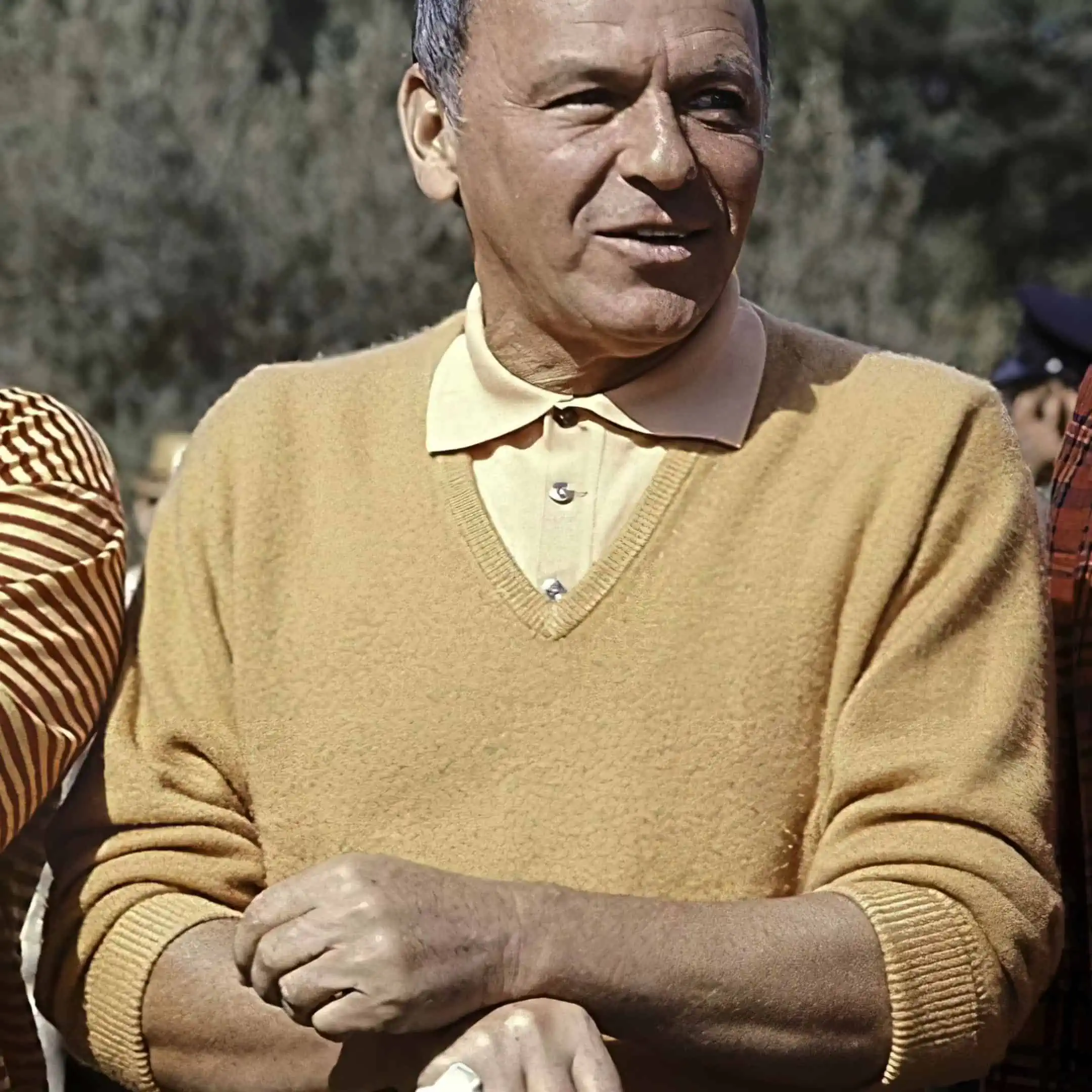 Photo of Frank Sinatra in yellow pull over v neck sweater jumper