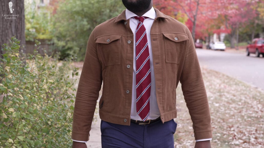 Kyle dressed up in a more comfortable casual outfit paired up with a tie from Fort Belvedere.