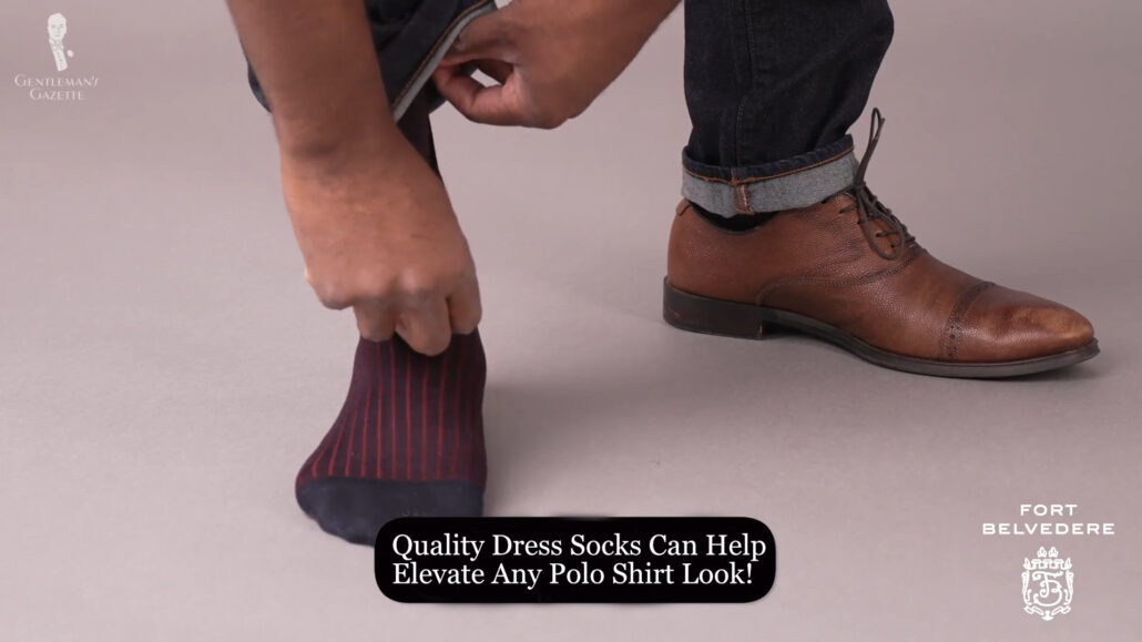 Photo of Kyle wearing midnight blue and burgundy Fort Belvedere socks casual leat