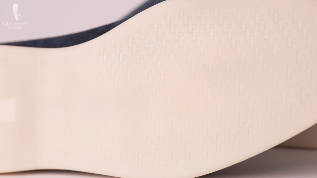The Loro Piana soles are made of gum rubber and are embossed with the Loro Piana logo.