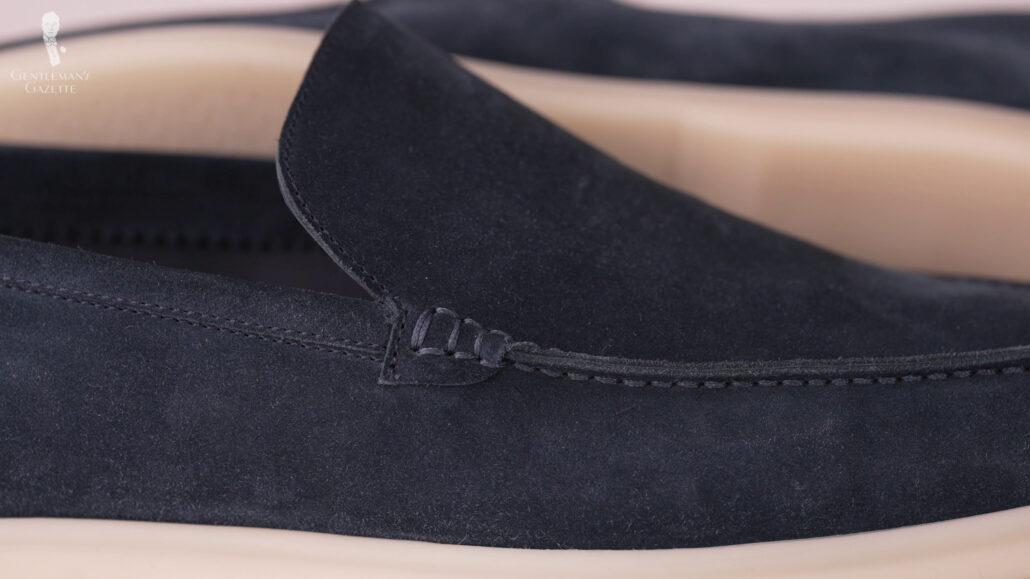 The uppers are made of suede that is very soft to the touch with a crisp, elegant nap and with no rough spots.