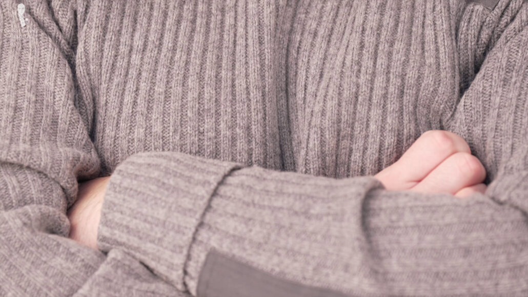 This gray knitwear can compliment any basic subtle hues you have in your wardrobe.