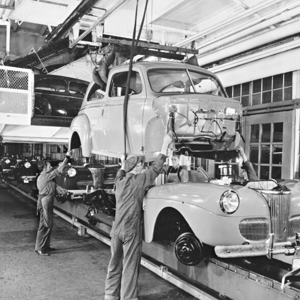 This vintage photograph shows the Ford assembly line