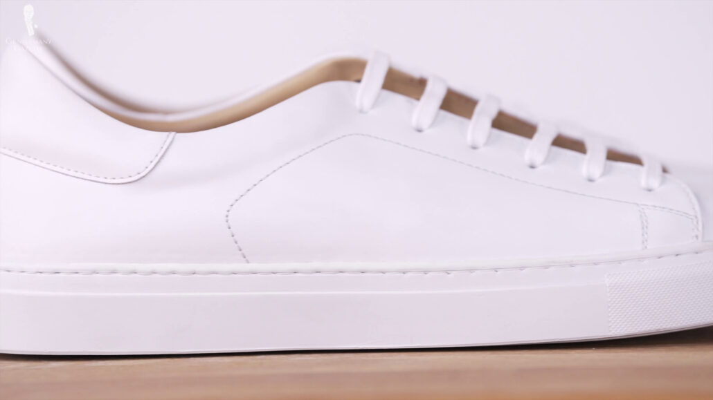 You may opt for a classic white dress sneakers for any casual outfit.