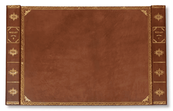 A brown leather desk mat from Scully & Scully