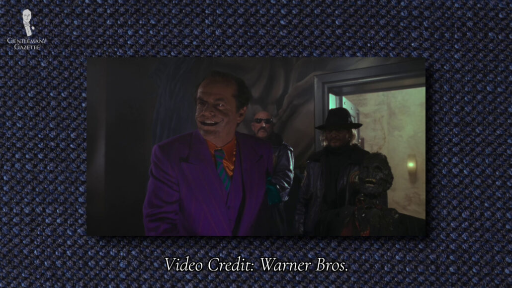 The Joker wearing the purple double-breasted suit.