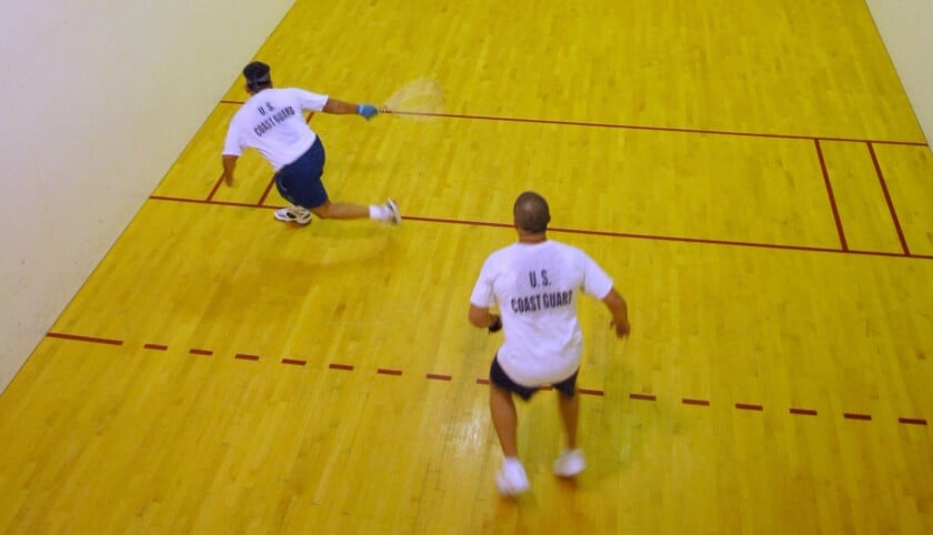 Two Men Playing Racquetball Image Credit Wikimedia Photo of two men playing racquetball
