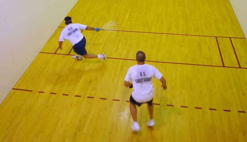 Photo of two men playing racquetball