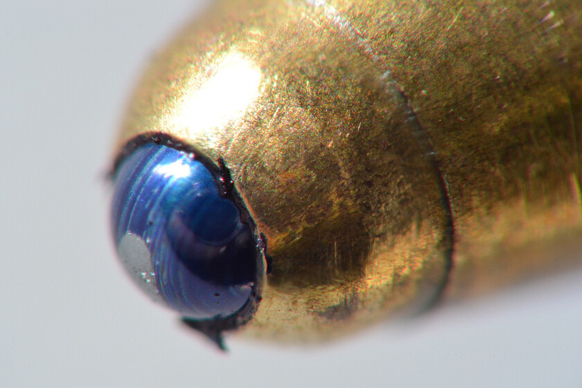 Photo of the tip of a ballpoint pen 