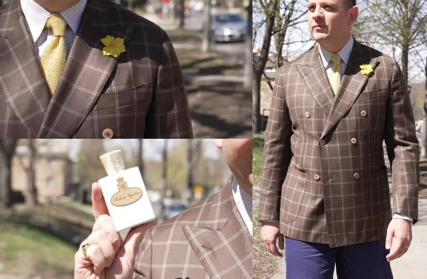 Raphael wearing a double-breasted brown sport coat with a double windowpane overcheck.