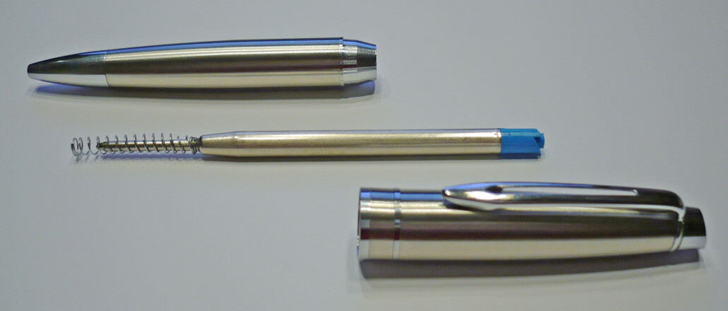 Photo of a disassembled ballpoint pen 
