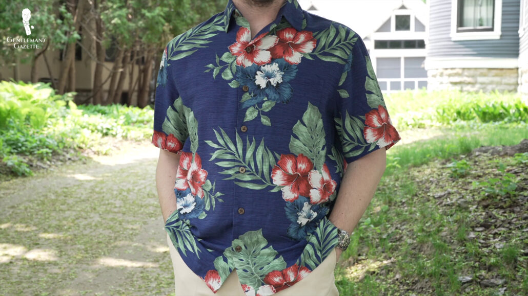 Chris wearing a Hawaiian Shirt in the suburbs.