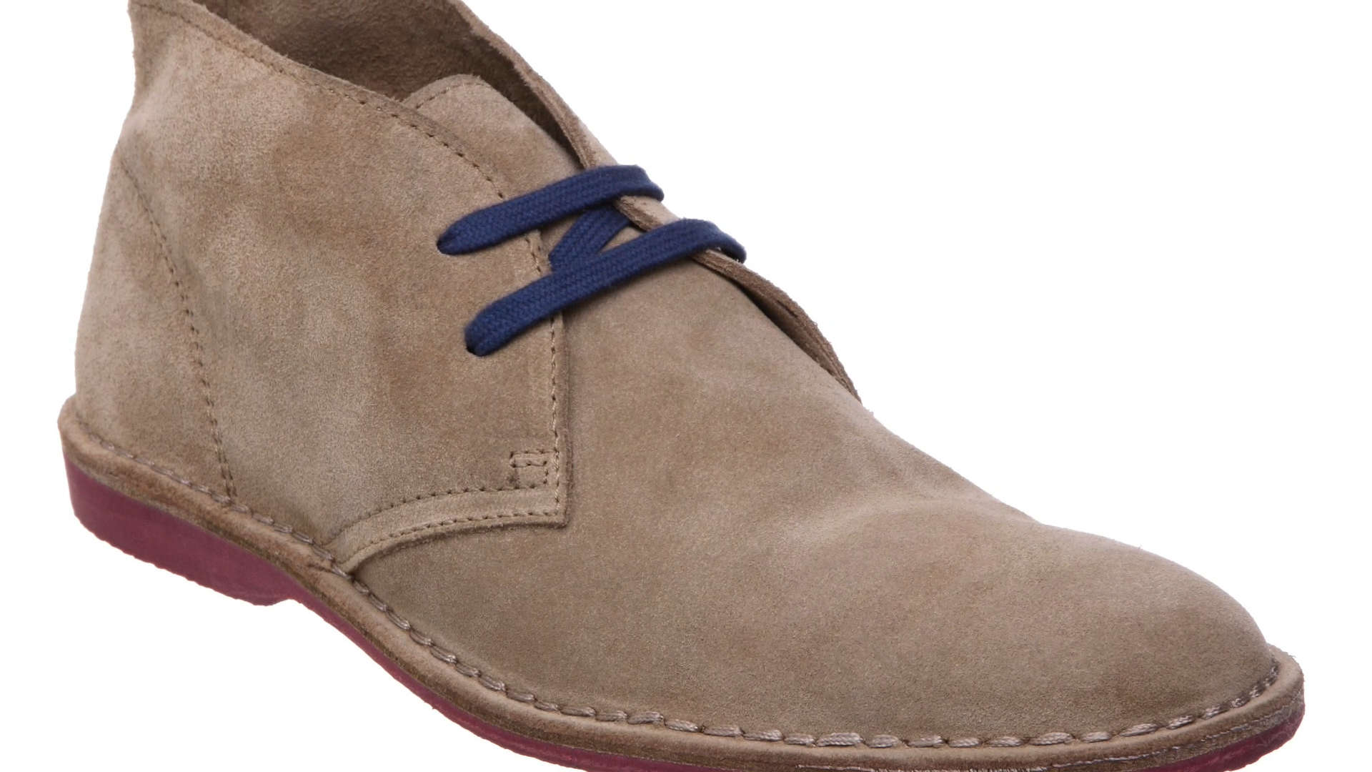 Photo of Buff chukka boot with cobalt blue shoe laces for a more casual look