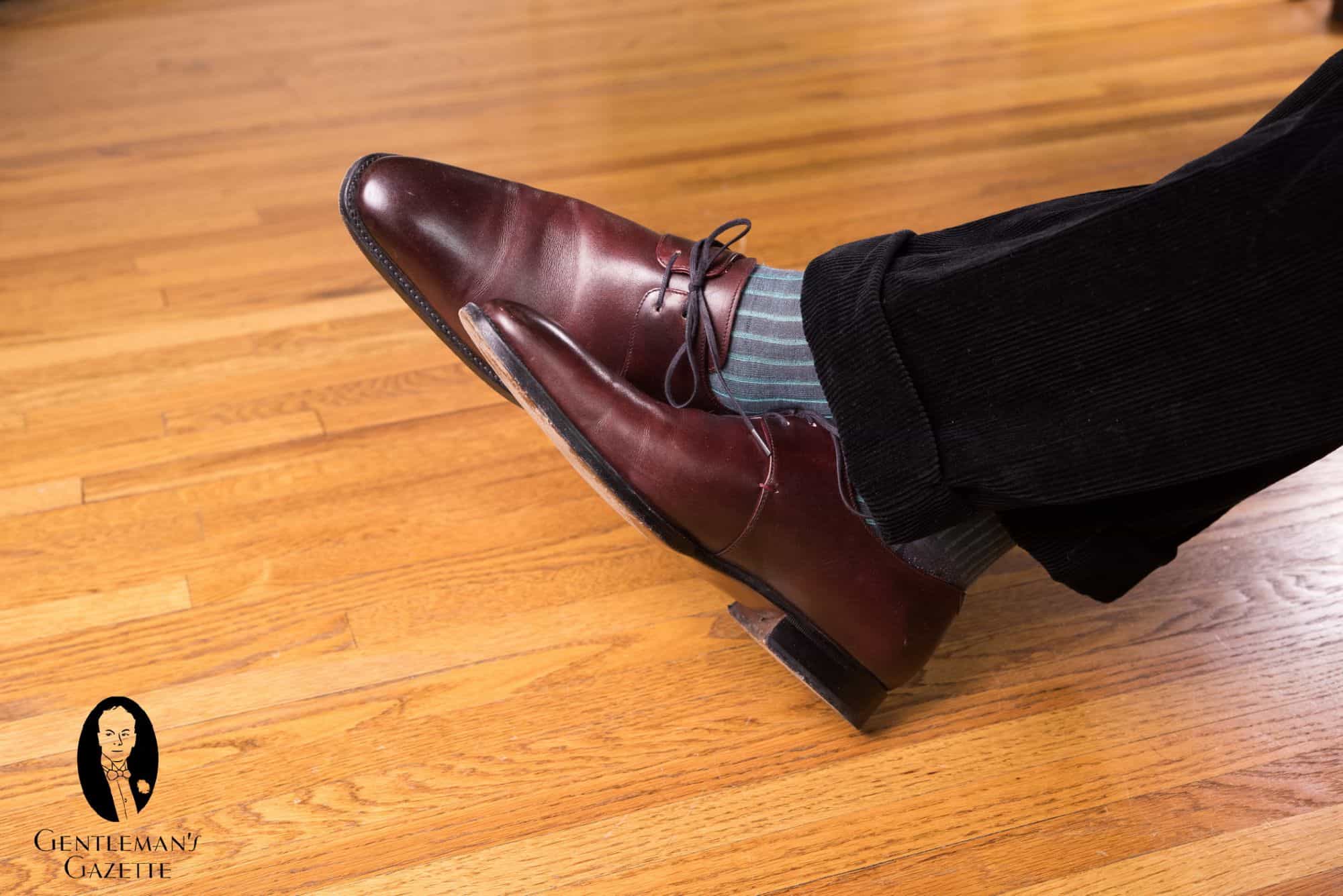 Photo of Grey and Turquoise Fort Belvedere socks with oxblood derbies and dark corduroy trousers.jpg