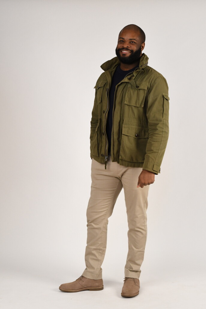 Photo of Kyle green jacket navy knitted sweater chinos pants chukka boots