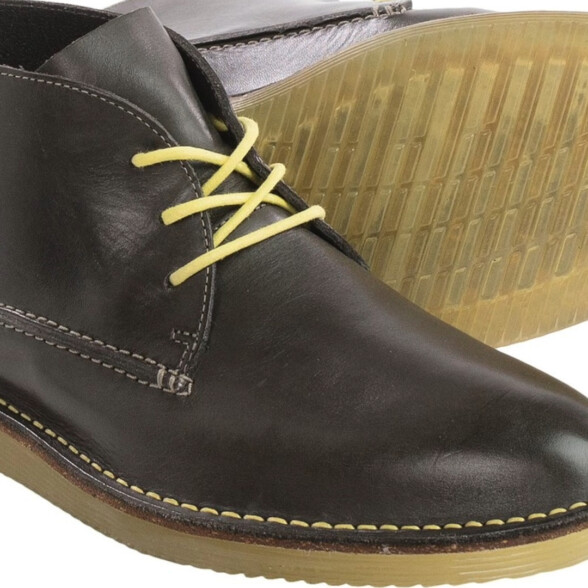 Photo of Pair of chukka boots with high contrast detailing