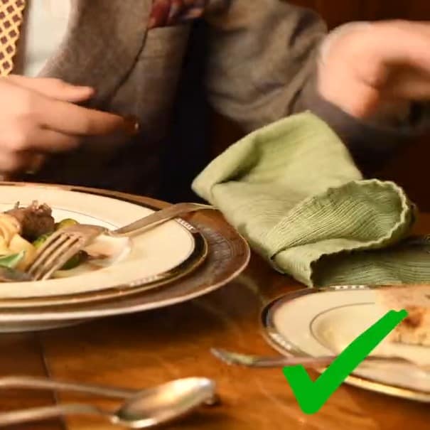 Photo of Raphael properly placing his napkin to the side of his plate