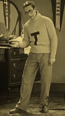 Photo of Harold Lloyd in parody of collegiate attire from The Freshman 1925