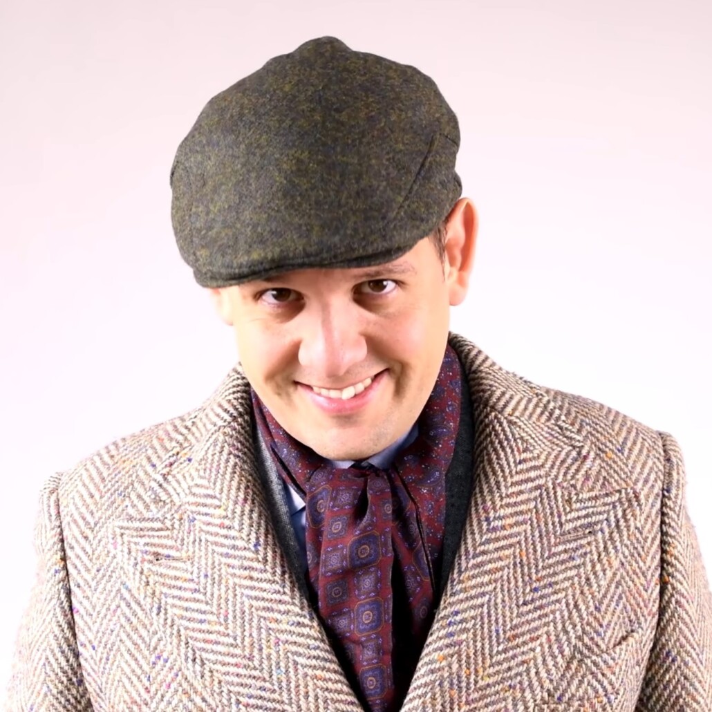 Photo of Pairing bold outerwear with solid flat caps