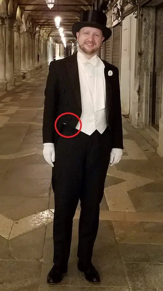 Photo of White Tie waistcoat that is too long and peaks out behind tailcoat