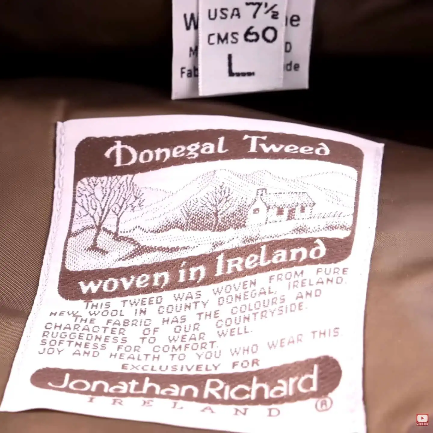 Photo of label of Donegal Tweed flat cap woven in Ireland by Jonathan Richard with size label visible