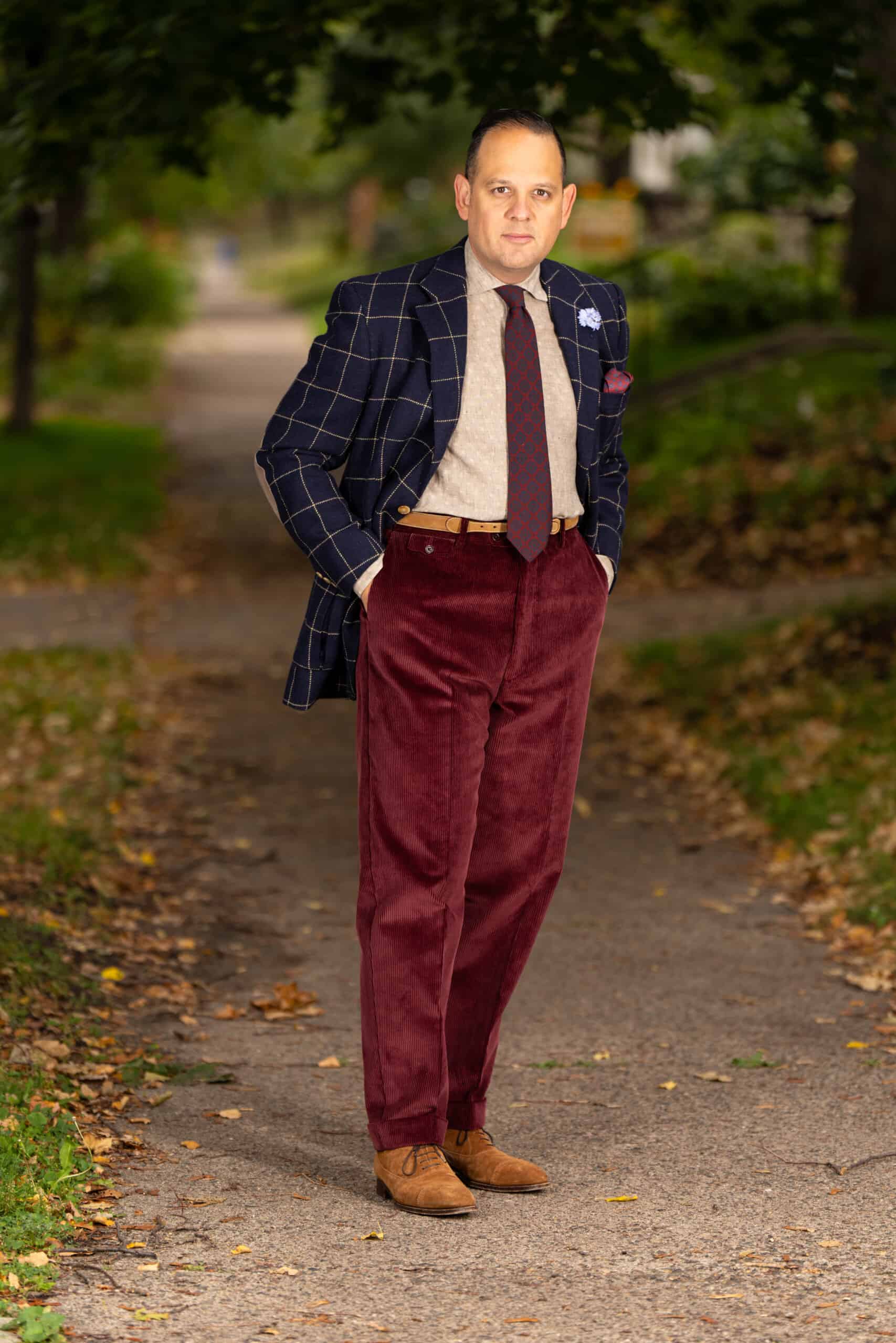 Maroon Corduroy With Windowpane Sport Coat And Red And Blue Tie Scaled Photo of Raphael wearing Maroon corduroy with windowpane sport coat and red and blue tie