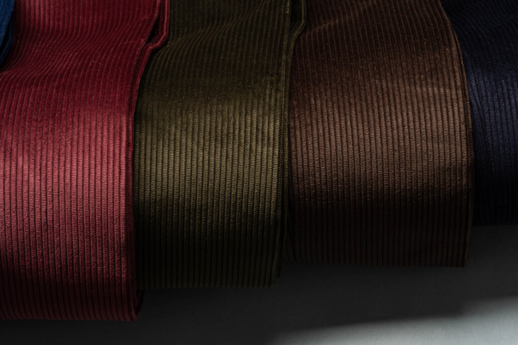 Photo of an array of matte corduroy trousers