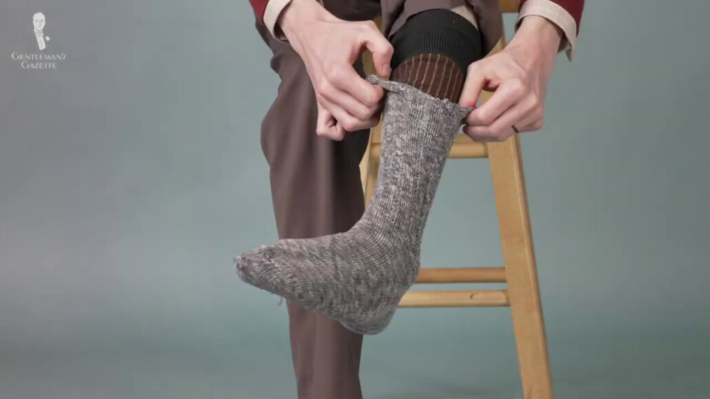 Wearing a thicker or multiple pairs of socks can stretch your too tight shoes when wearing them for a few hours.