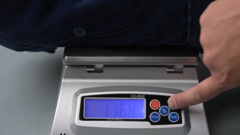 Weighing Corduroy Fabric Photo of Weighing corduroy fabric