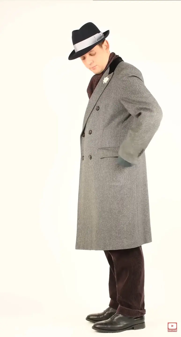 Photo of Raphael in an overcoat