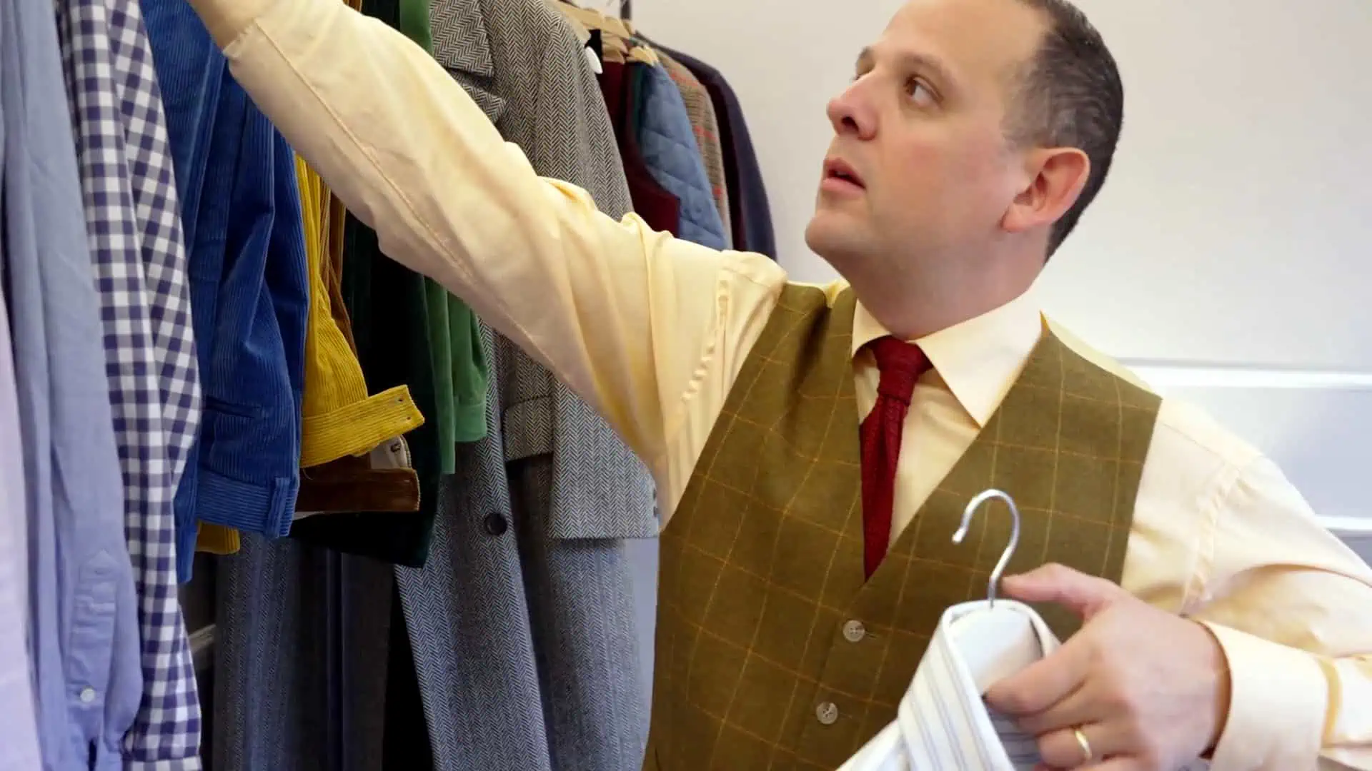 Raphael searches through the shirts he packed for Pitti Uomo 105