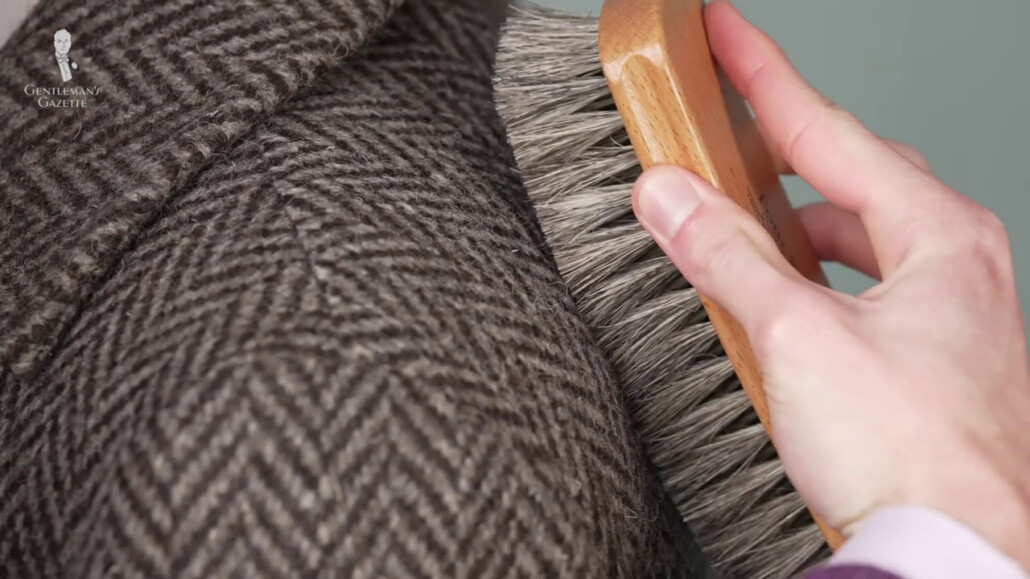 cleaning of garment using a shoe brush